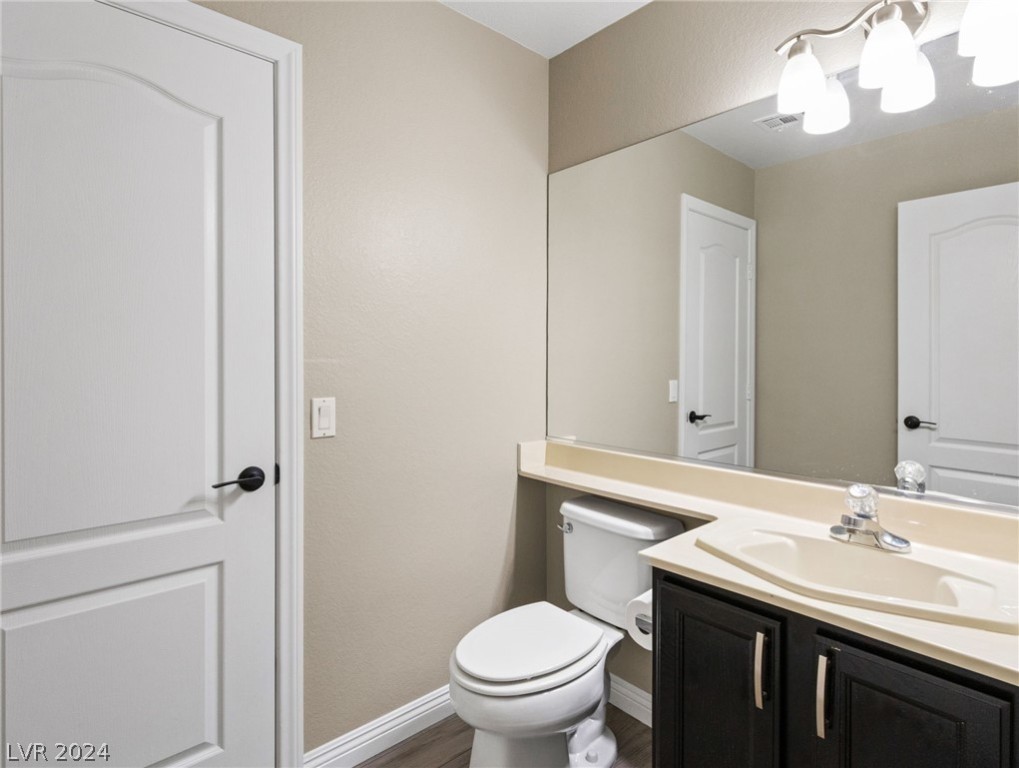 365 Kenya Road Las Vegas, NV 89123 - Photo 26 of 47 Powder room downstairs with lots of storage!