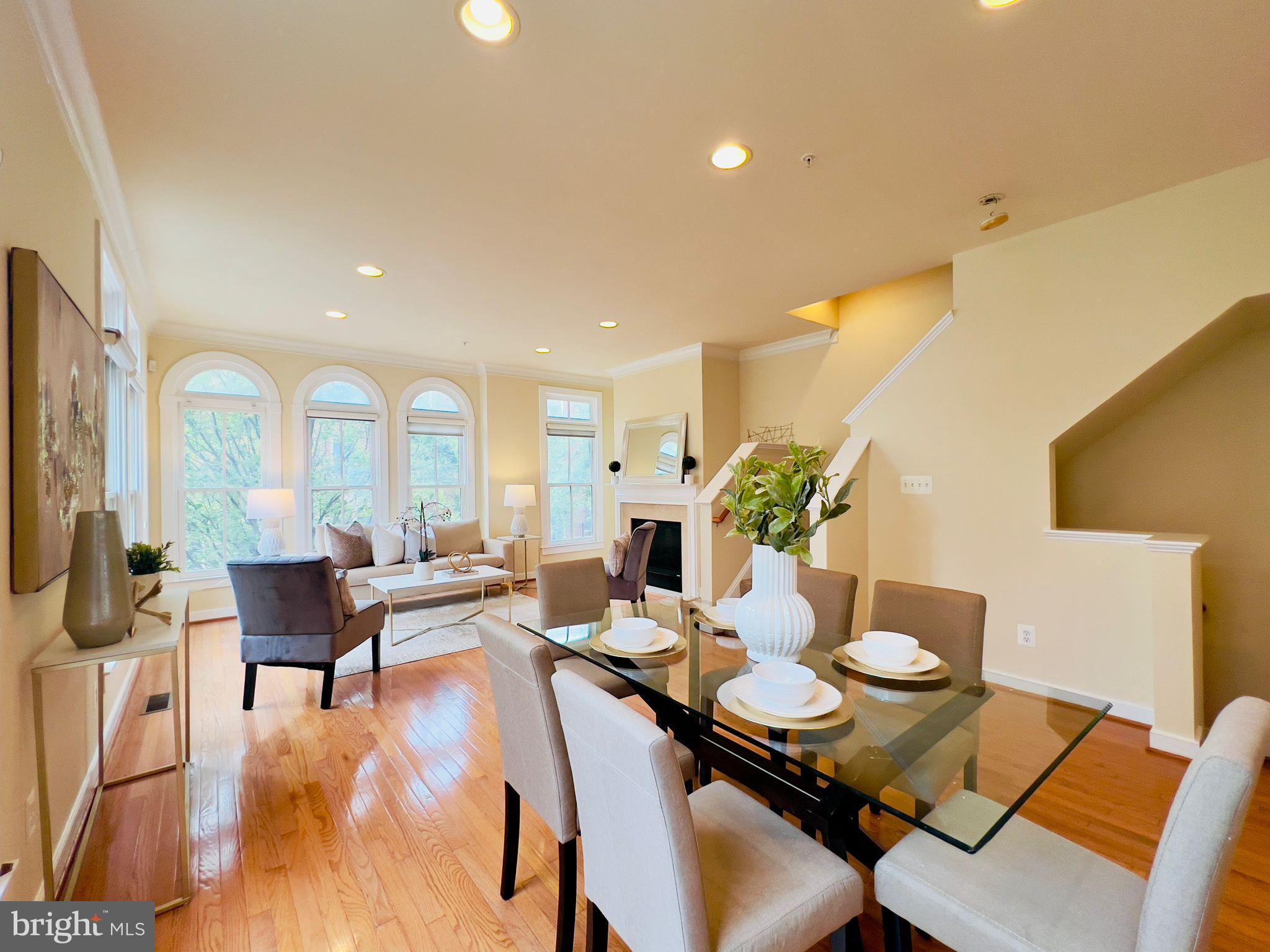 2301 Cobble Hill Terrace Silver Spring, MD 20902 - Photo 6 of 28 a living room with dining table and wooden floor