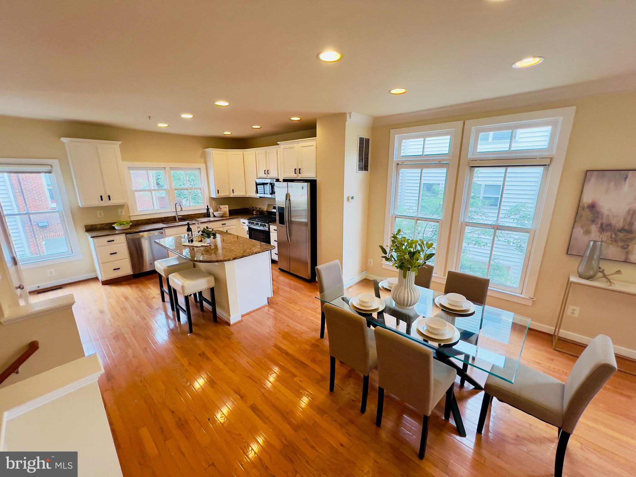 2301 Cobble Hill Terrace Silver Spring, MD 20902 - Photo 7 of 28 a living room with dining room and wooden floor