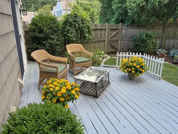 a view of a chairs and table on the wooden floor