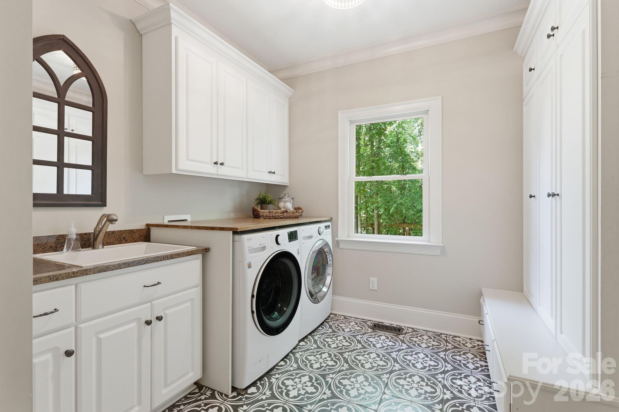 235 Grey Road Davidson, NC 28036 - Photo 16 of 42 a utility room with window washer and dryer