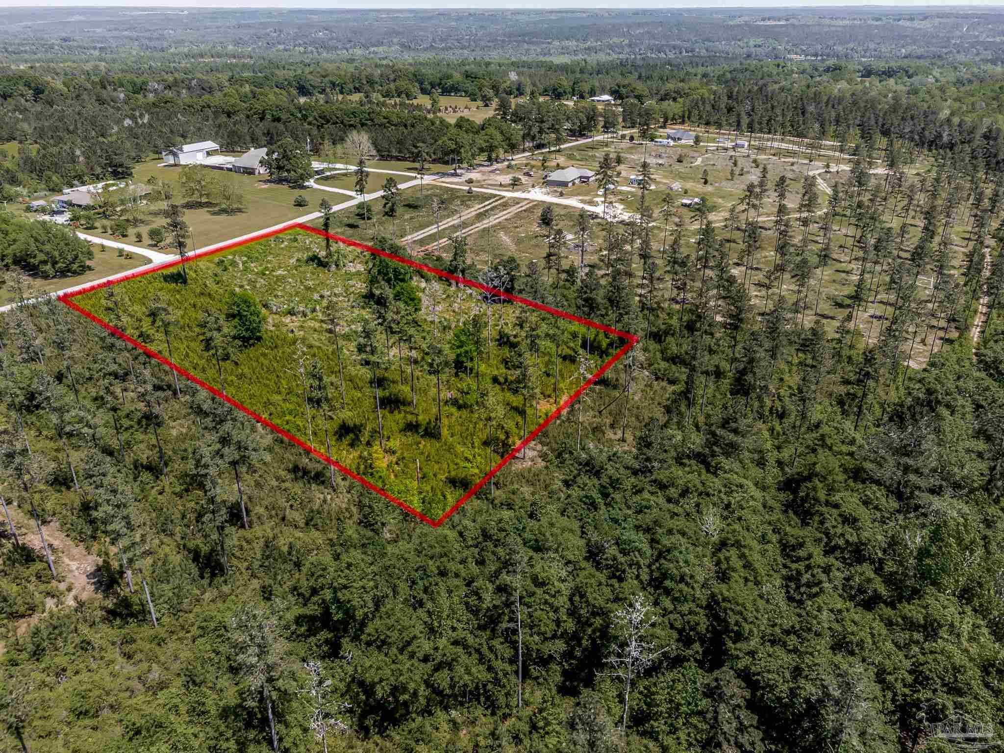 0 Allen Road Atmore, AL 36502 - Photo 2 of 29 an aerial view of a residential houses with outdoor space and trees