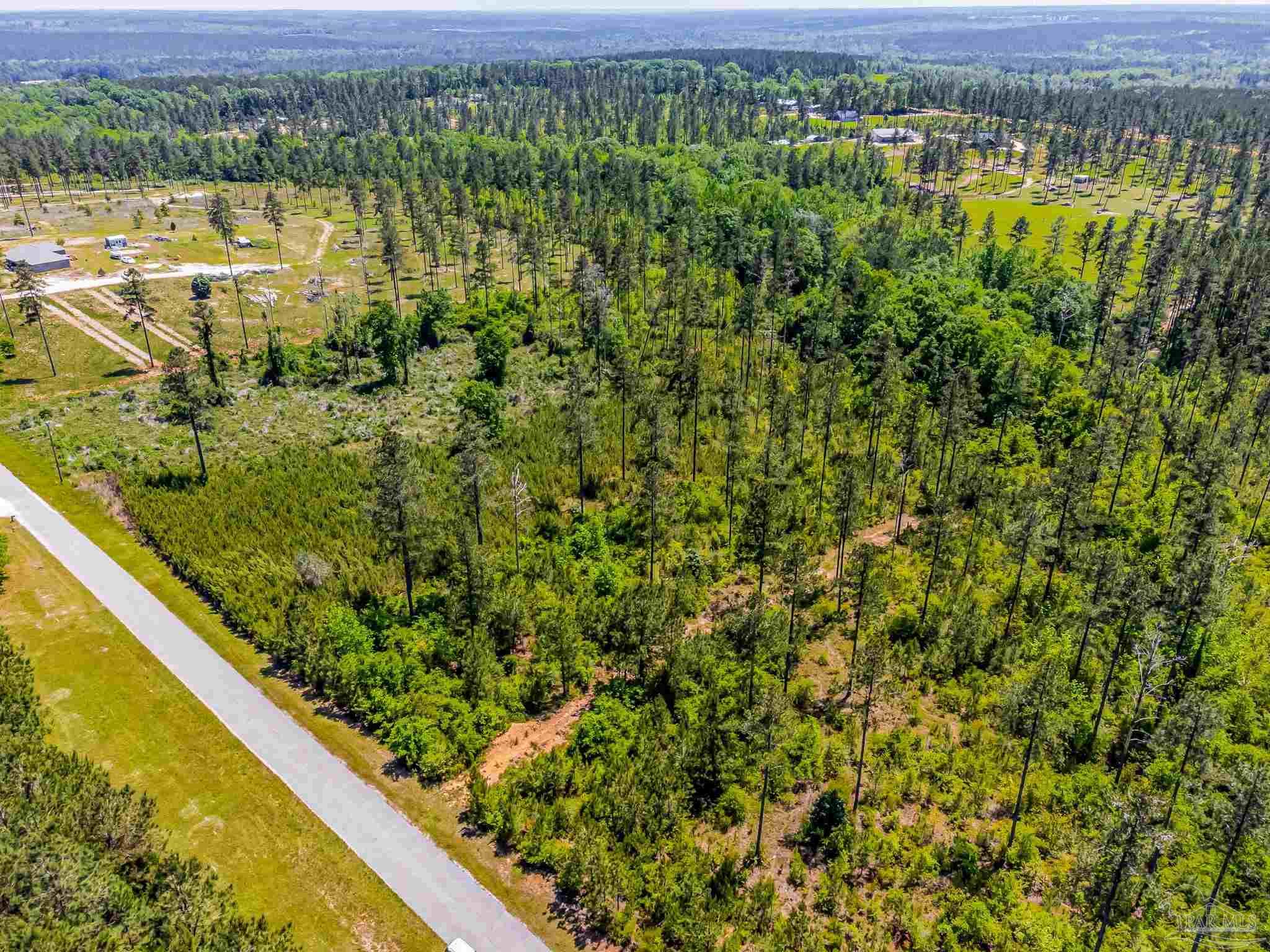 0 Allen Road Atmore, AL 36502 - Photo 24 of 29 a view of a lake from a balcony