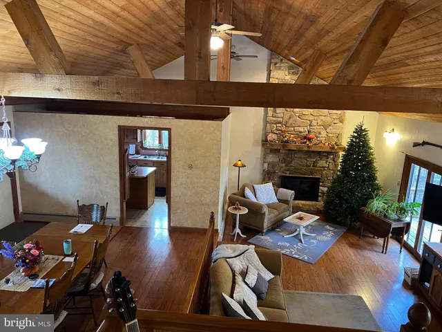 a kitchen with wooden cabinets and a stove top oven