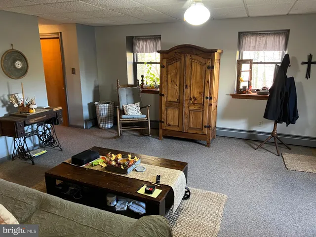 a bathroom with a toilet and a sink