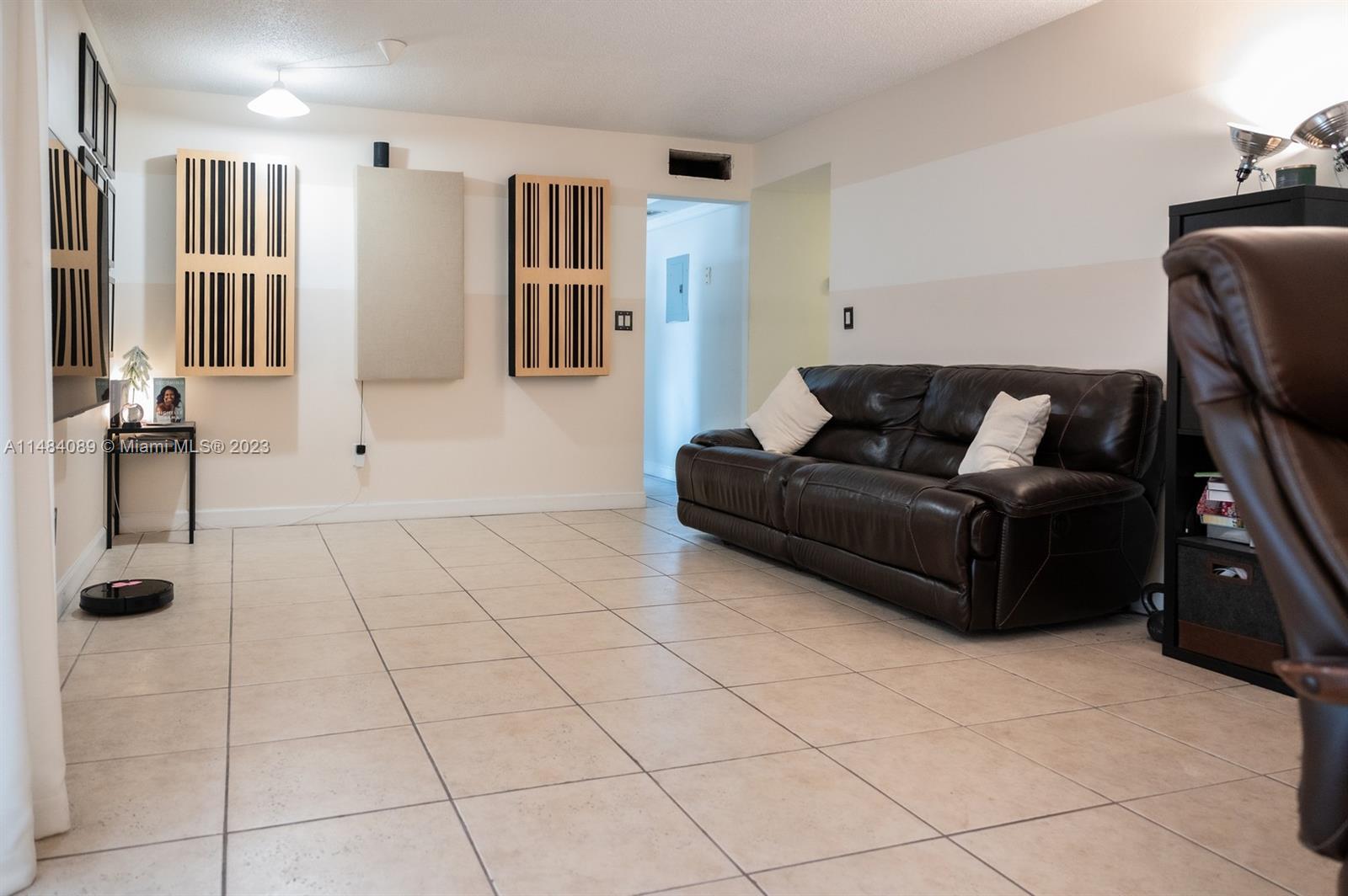 7715 Southwest 86th Street, Unit A2307 Miami, FL 33143 - Photo 17 of 89 a living room with furniture