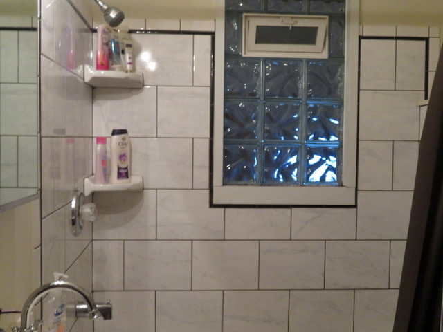2040 Carter Street Racine, WI 53402 - Photo 7 of 19 a bathroom with a shower