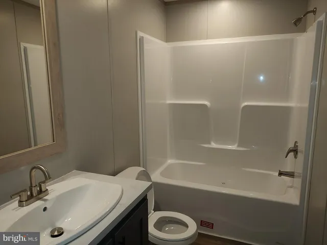 a bathroom with a sink and a tub