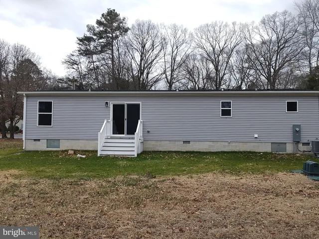 a view of a backyard with a garden