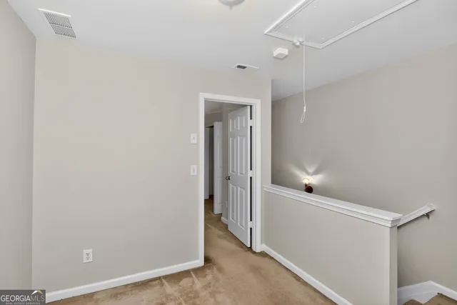a bathroom with a bathtub shower sink vanity and toilet