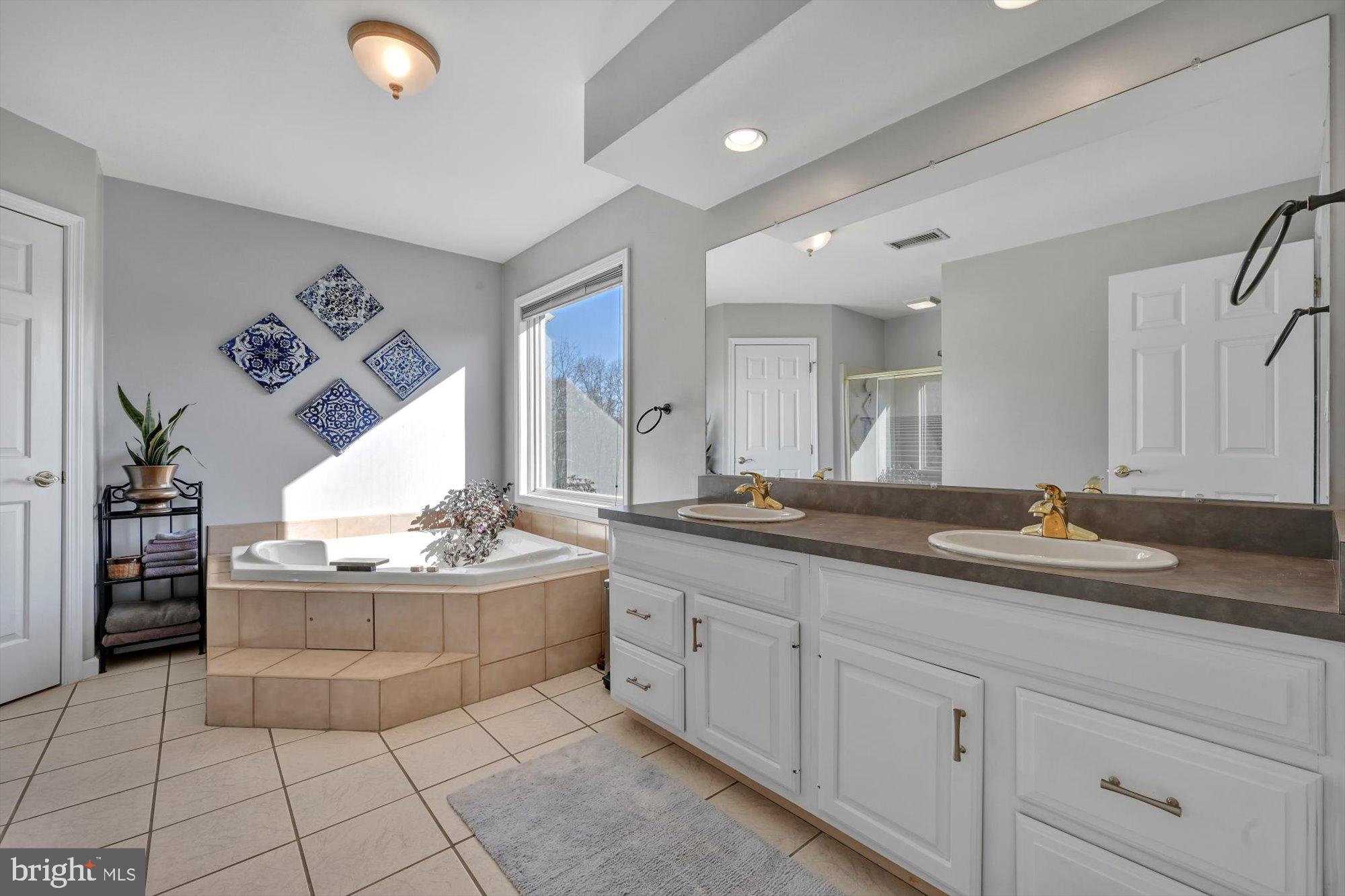 6 Jackson Road Pottsville, PA 17901 - Photo 19 of 36 a bathroom with a sink and a mirror
