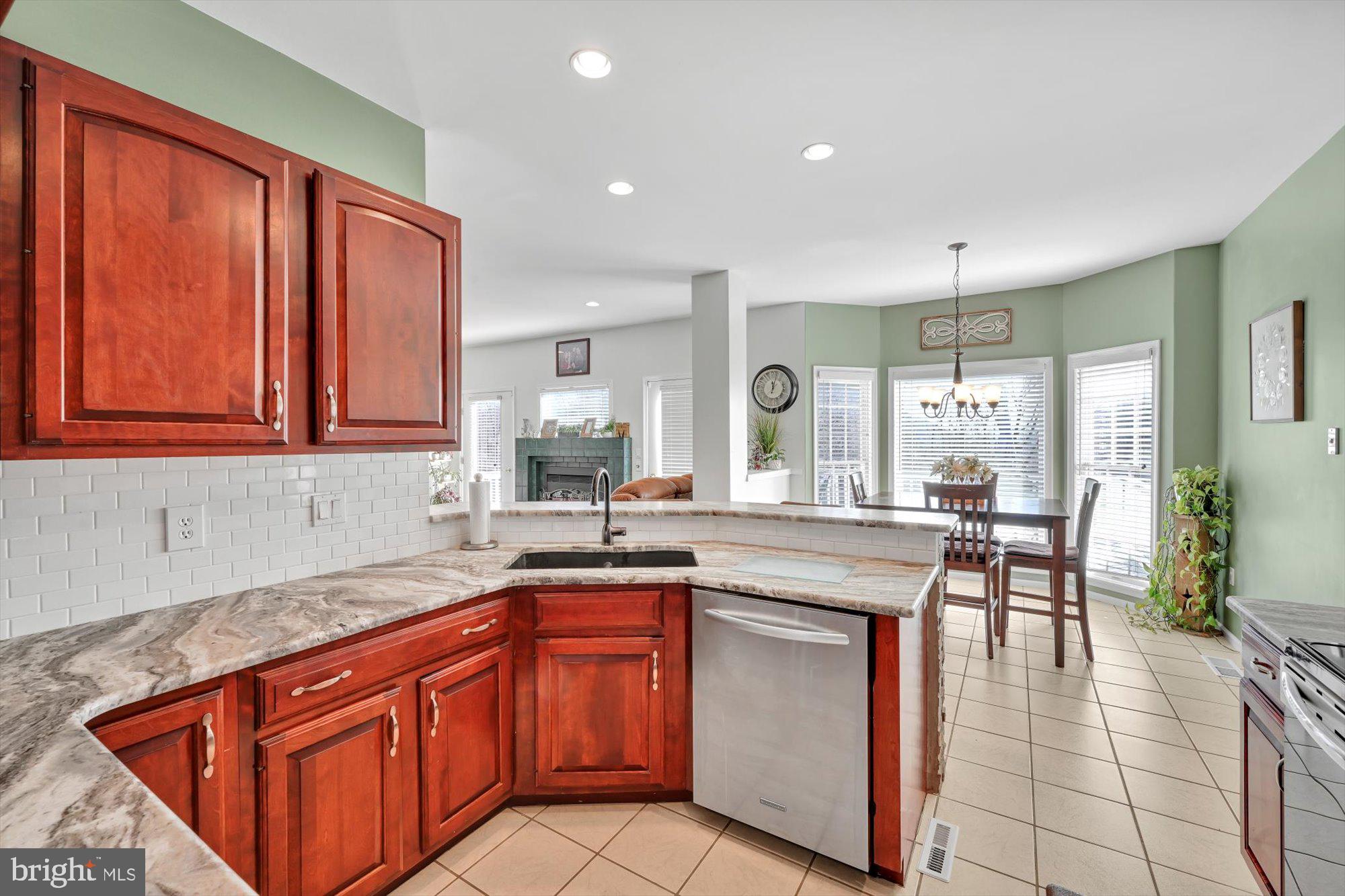 6 Jackson Road Pottsville, PA 17901 - Photo 5 of 36 a kitchen with stainless steel appliances granite countertop wooden cabinets a sink and dishwasher
