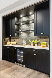 a work room with furniture and wooden floor