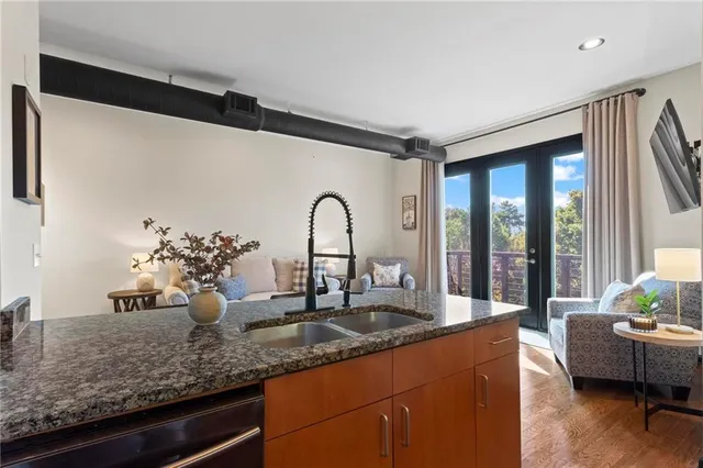 a kitchen with sink and window