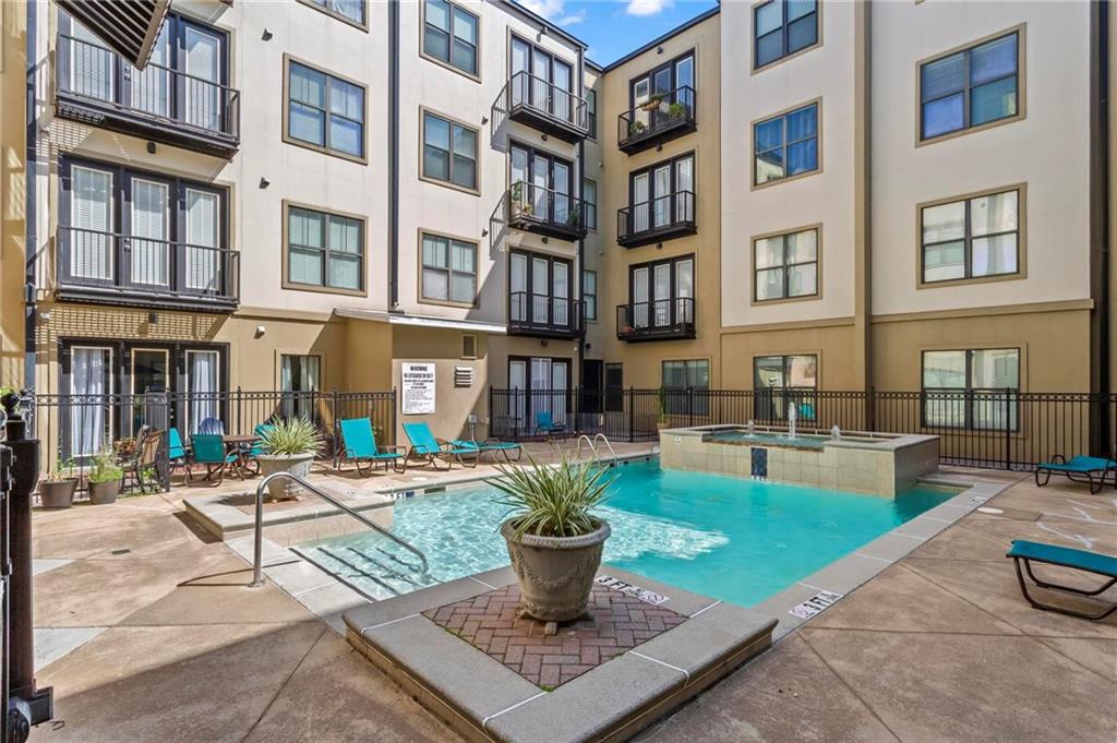 5300 Peachtree Road, Unit 4514 Atlanta, GA 30341 - Photo 31 of 38 a view of a patio with couches table and chairs and potted plants