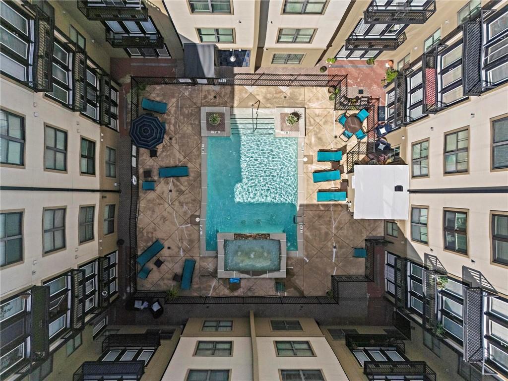 5300 Peachtree Road, Unit 4514 Atlanta, GA 30341 - Photo 32 of 38 a front view of a building with a lot of windows