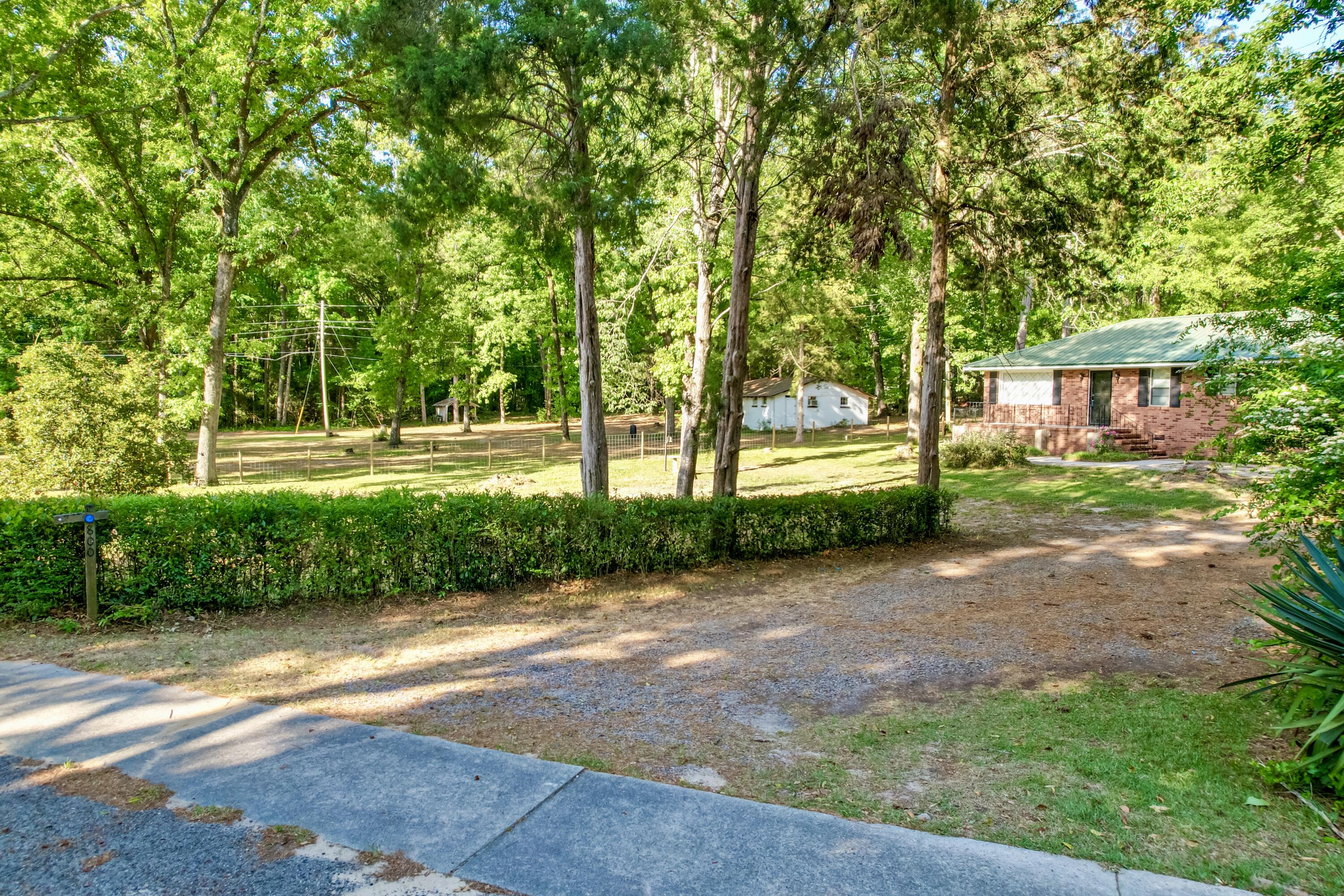 800 Old Whiskey Road South New Ellenton, SC 29809 - Photo 27 of 31 a view of a backyard with large trees