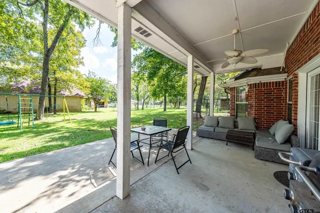a outdoor space with furniture and garden