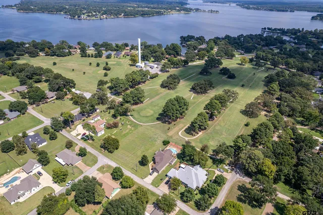 an aerial view of residential house with outdoor space