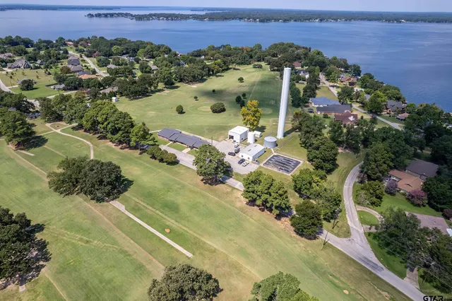 an aerial view of a house with a garden