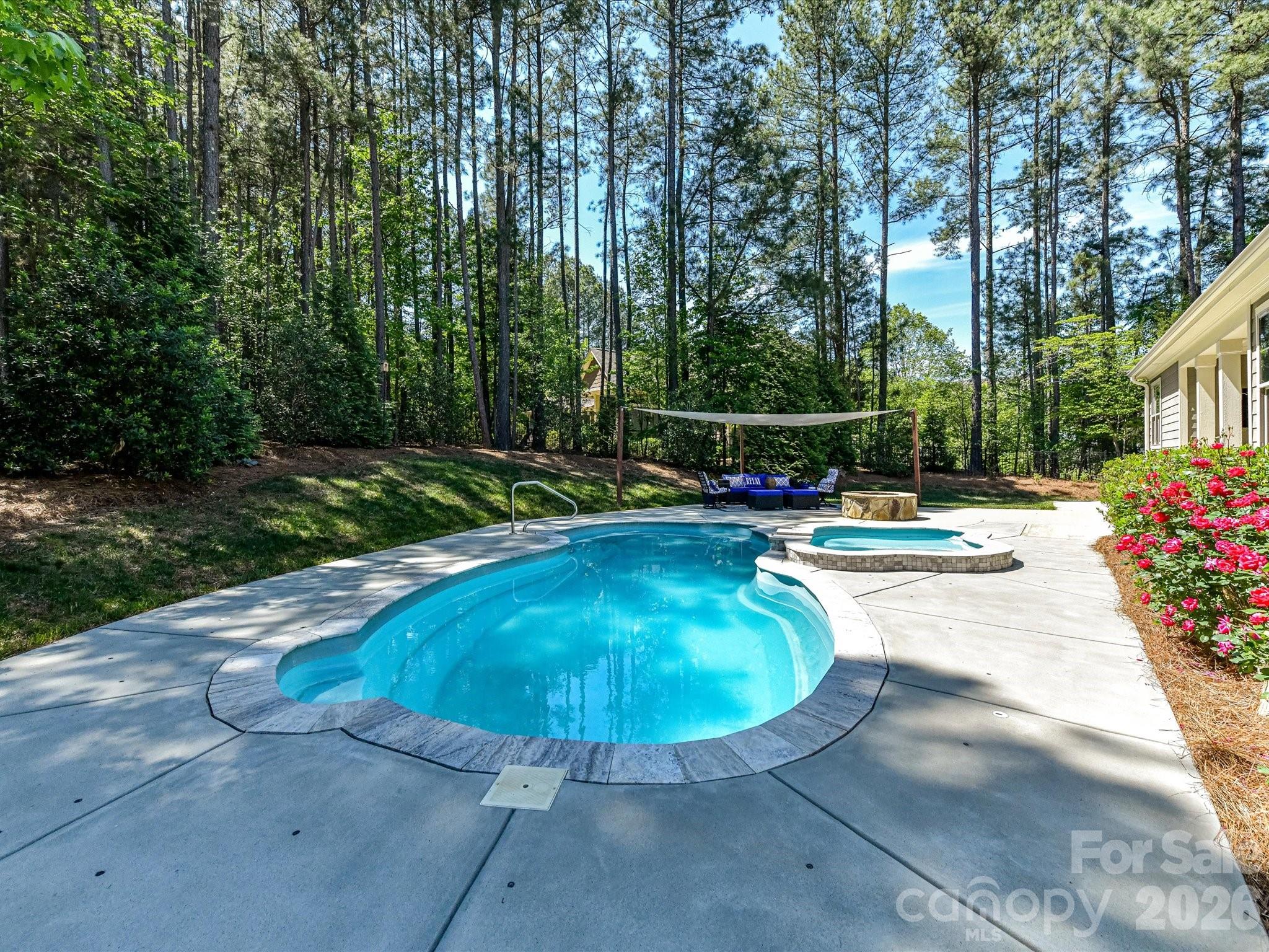 205 Streamwood Road Troutman, NC 28166 - Photo 2 of 41 a view of a swimming pool with an outdoor space