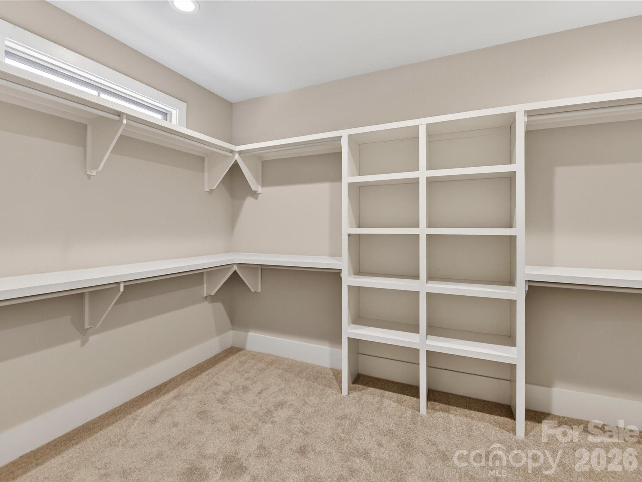 205 Streamwood Road Troutman, NC 28166 - Photo 23 of 41 a view of an empty walk in closet
