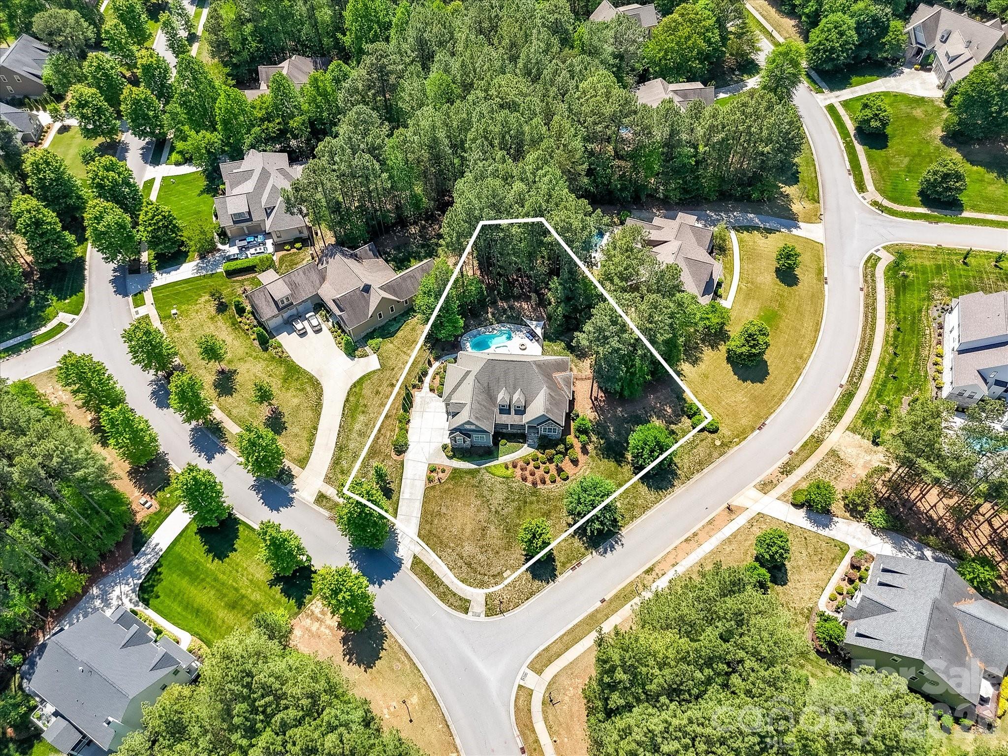 205 Streamwood Road Troutman, NC 28166 - Photo 3 of 41 an aerial view of a house with a swimming pool