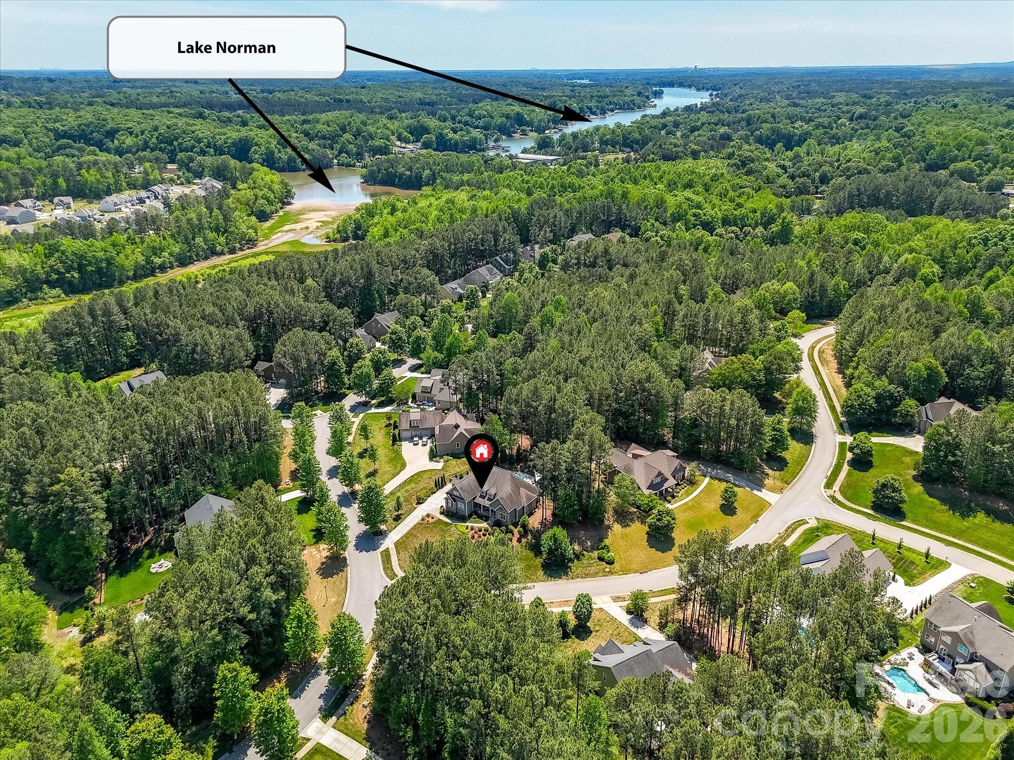 205 Streamwood Road Troutman, NC 28166 - Photo 39 of 41 an aerial view of a house with a yard and lake view