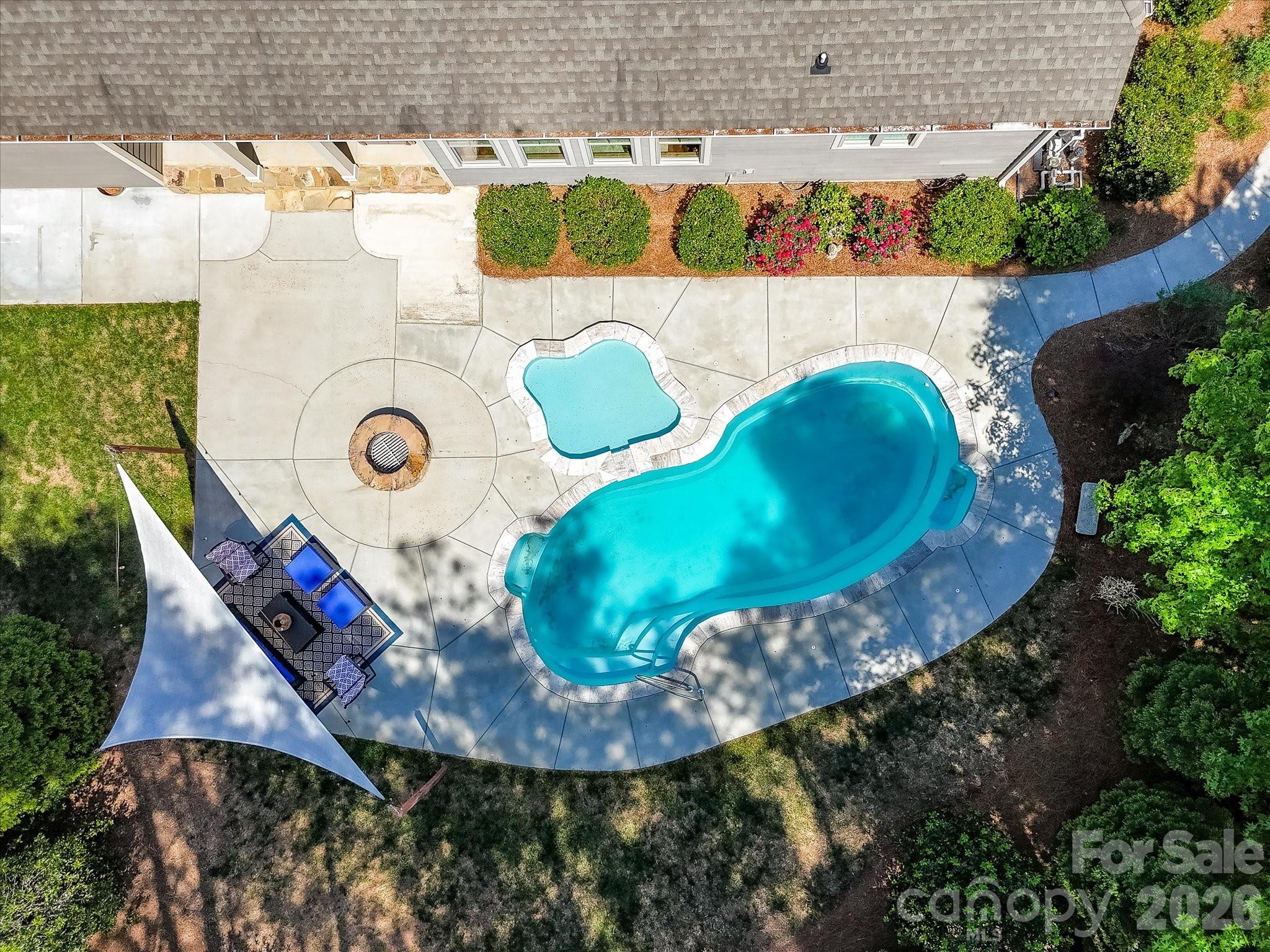 205 Streamwood Road Troutman, NC 28166 - Photo 4 of 41 an aerial view of a house swimming pool and a yard