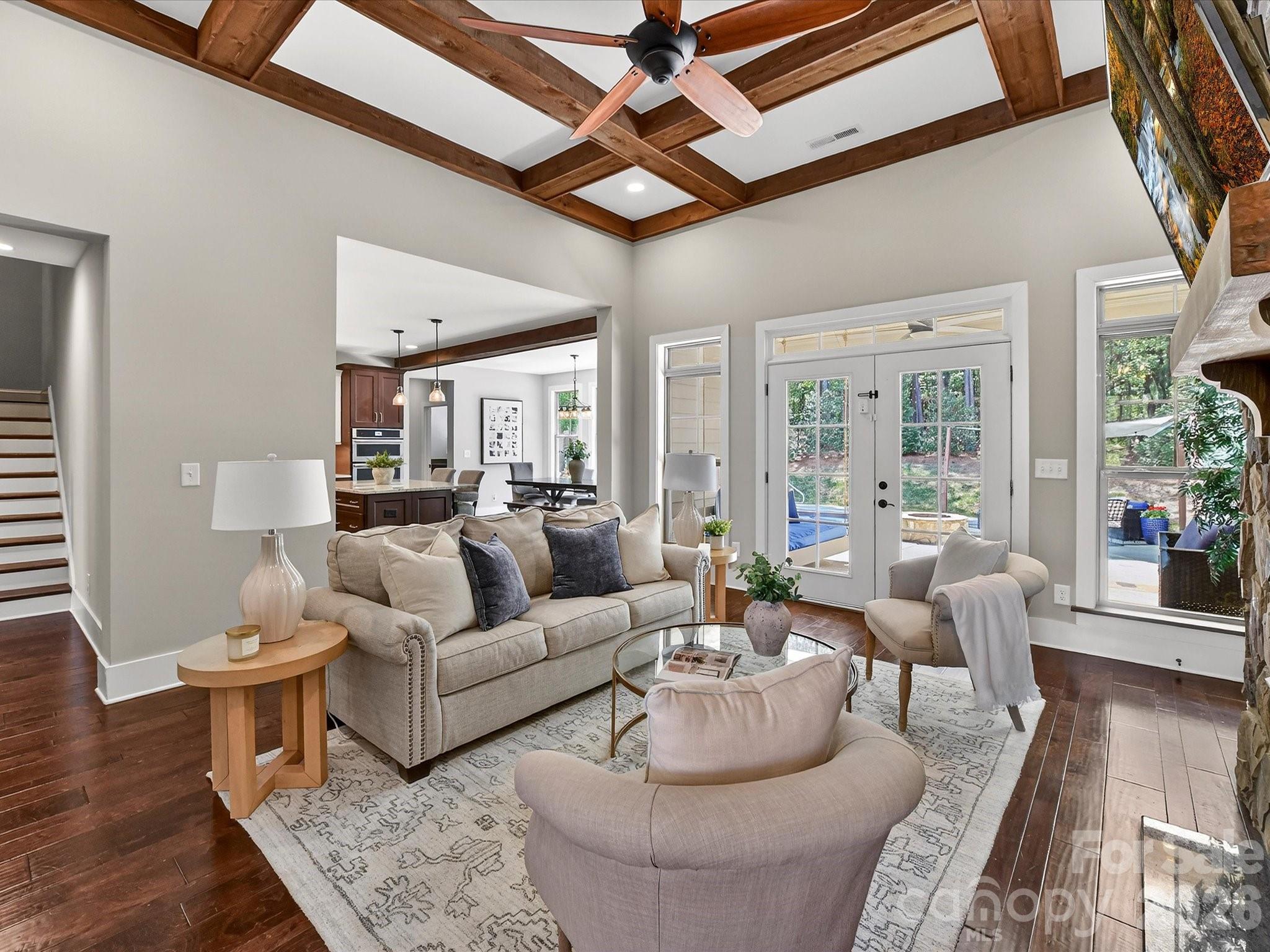 205 Streamwood Road Troutman, NC 28166 - Photo 9 of 41 a living room with furniture and a rug