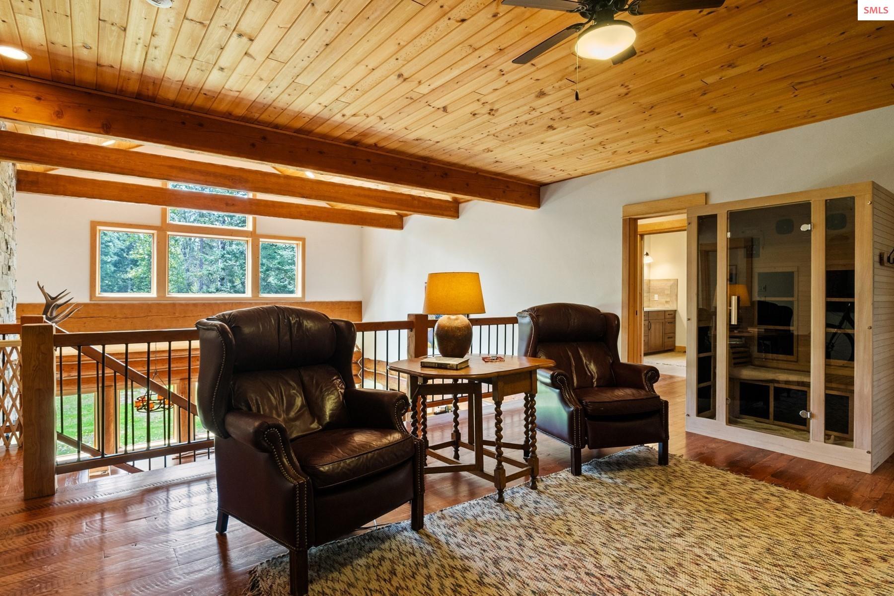 7017-7019 Colburn Culver Road Sandpoint, ID 83864 - Photo 18 of 54 This transition space on the upper level allows for another gathering area for friends and family