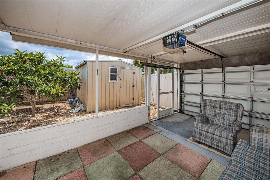4902 Vision Avenue Holiday, FL 34690 - Photo 21 of 25 a view of a garage