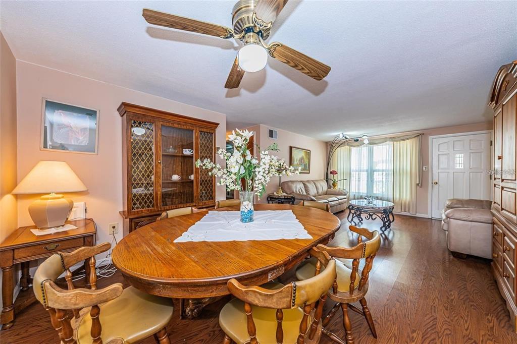 4902 Vision Avenue Holiday, FL 34690 - Photo 8 of 25 a outdoor space with furniture a rug and white walls