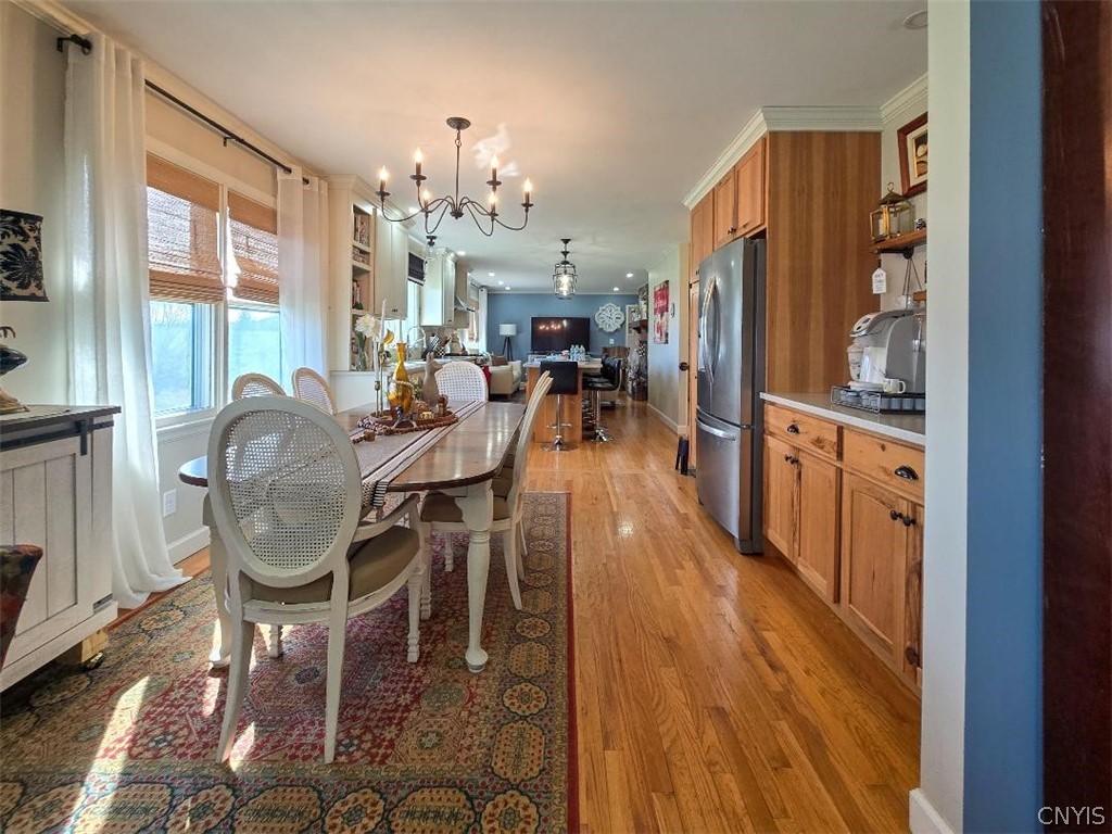 2886 West Lake Road Skaneateles, NY 13152 - Photo 11 of 46 Back inside, this is the long view of the dining r