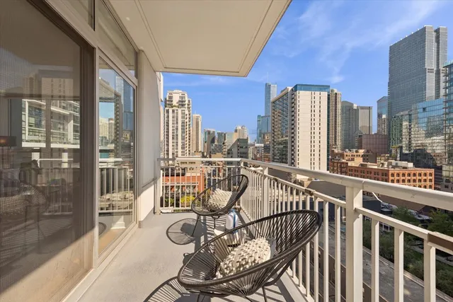 a view of a balcony with wooden floor