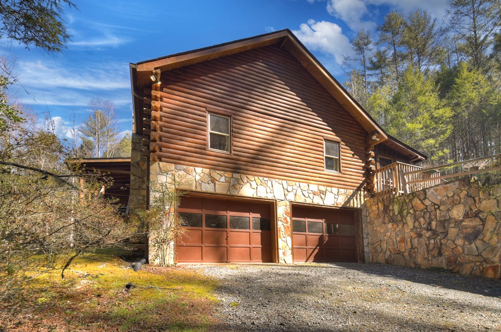 7233 Shakerag Road Ellijay, GA 30540 - Photo 106 of 117 a view of a house with a yard