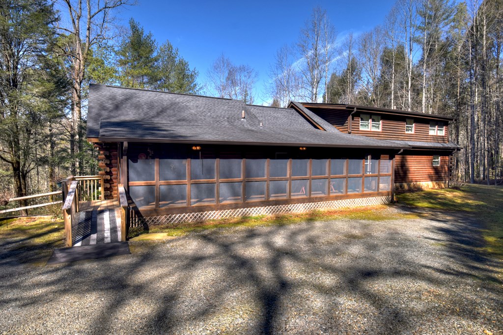 7233 Shakerag Road Ellijay, GA 30540 - Photo 113 of 117 a view of a house with a swimming pool and sitting area