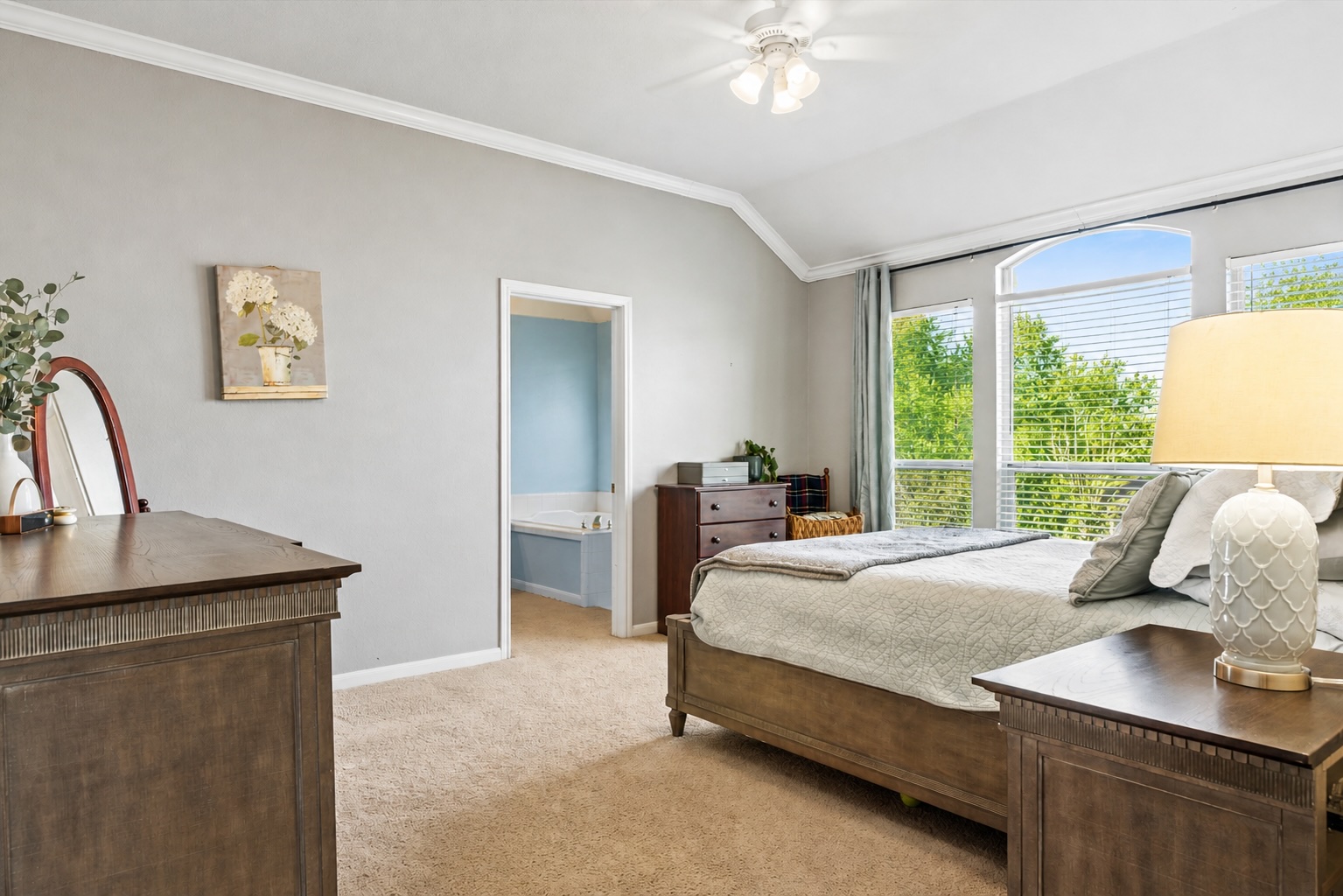 122 Summers Green Georgetown, TX 78633 - Photo 15 of 31 a bedroom with a bed and a chandelier