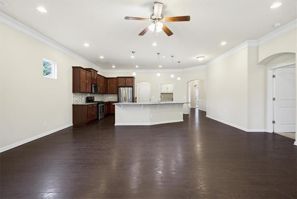 314 Boulder Run Hiram, GA 30141 - Photo 15 of 31 a view of kitchen with wooden floor and window