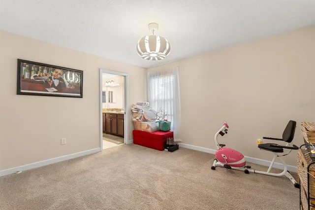 an aerial view of residential building with parking