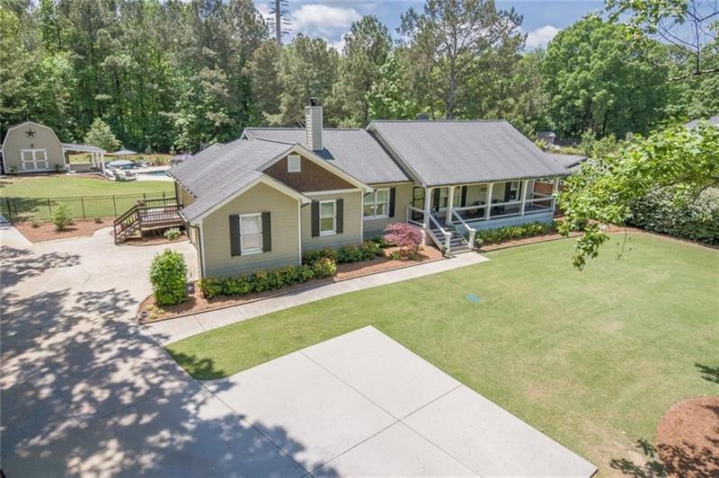 3179 Bart Johnson Road Buford, GA 30519 - Photo 1 of 1 a house view with a garden space
