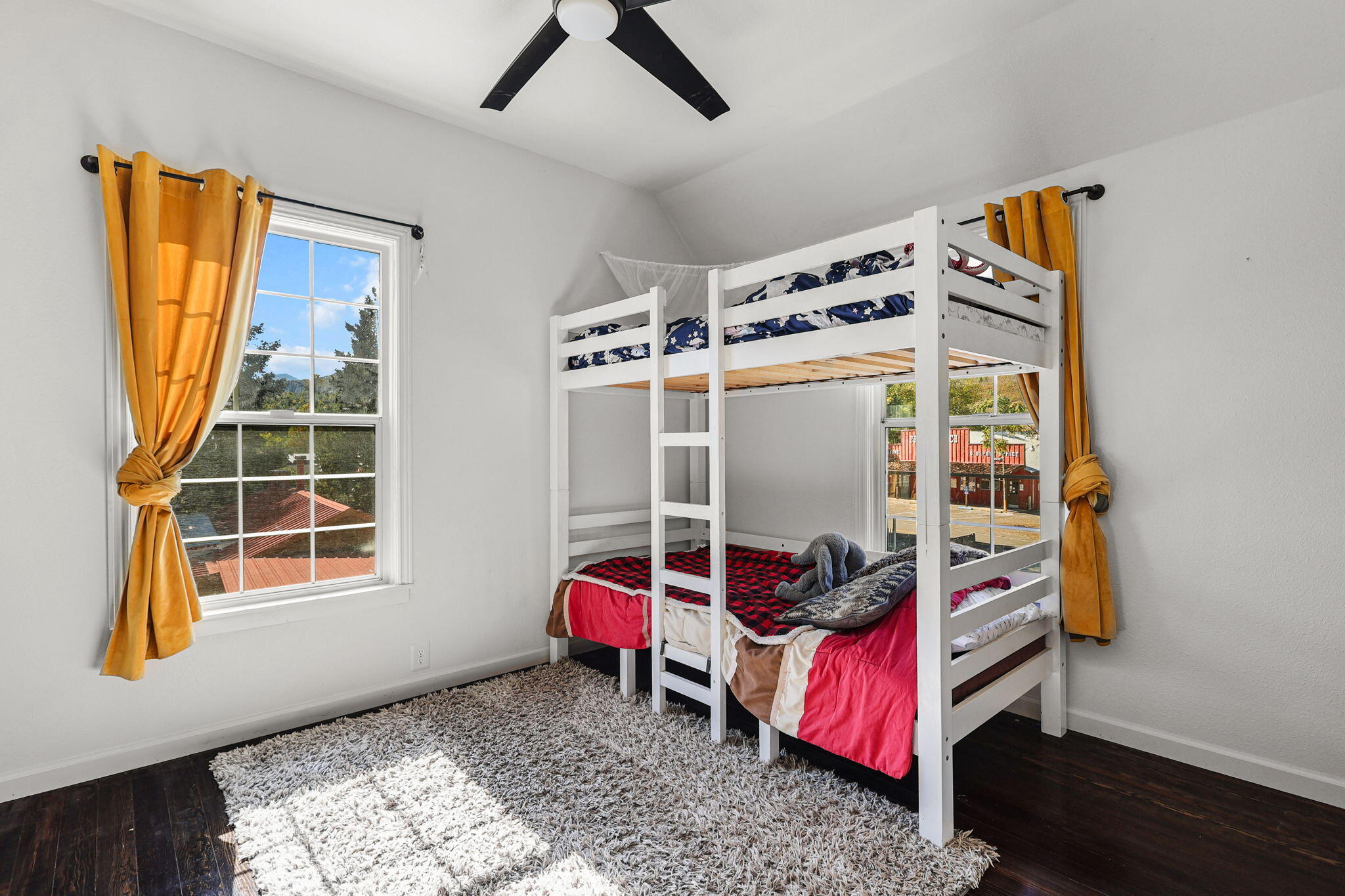 14207 Main Street French Gulch, CA 96033 - Photo 17 of 38 a bedroom with a bed and a window