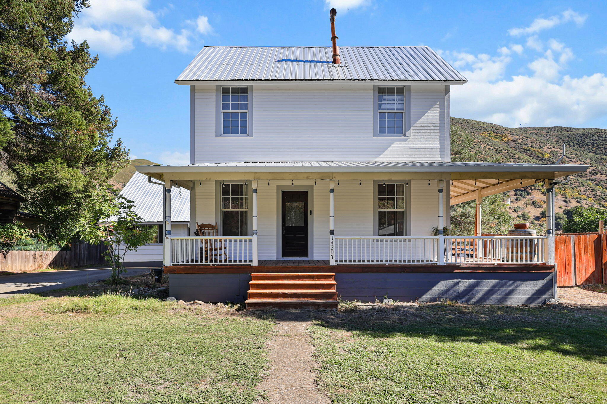 14207 Main Street French Gulch, CA 96033 - Photo 2 of 38 a view of a house with backyard porch and sitting area
