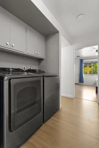 a kitchen with granite countertop a stove and a refrigerator