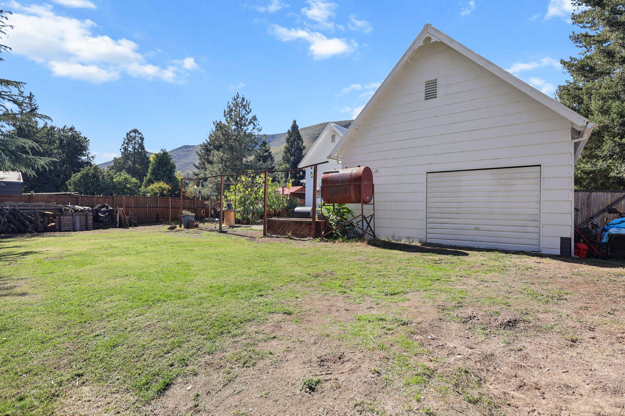 14207 Main Street French Gulch, CA 96033 - Photo 27 of 38 a view of a backyard of the house