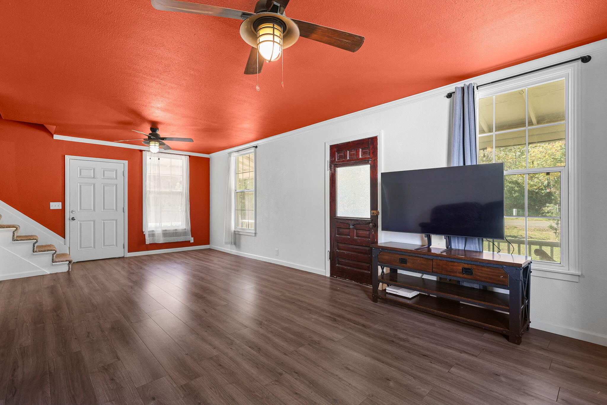 14207 Main Street French Gulch, CA 96033 - Photo 4 of 38 a living room with furniture and a flat screen tv