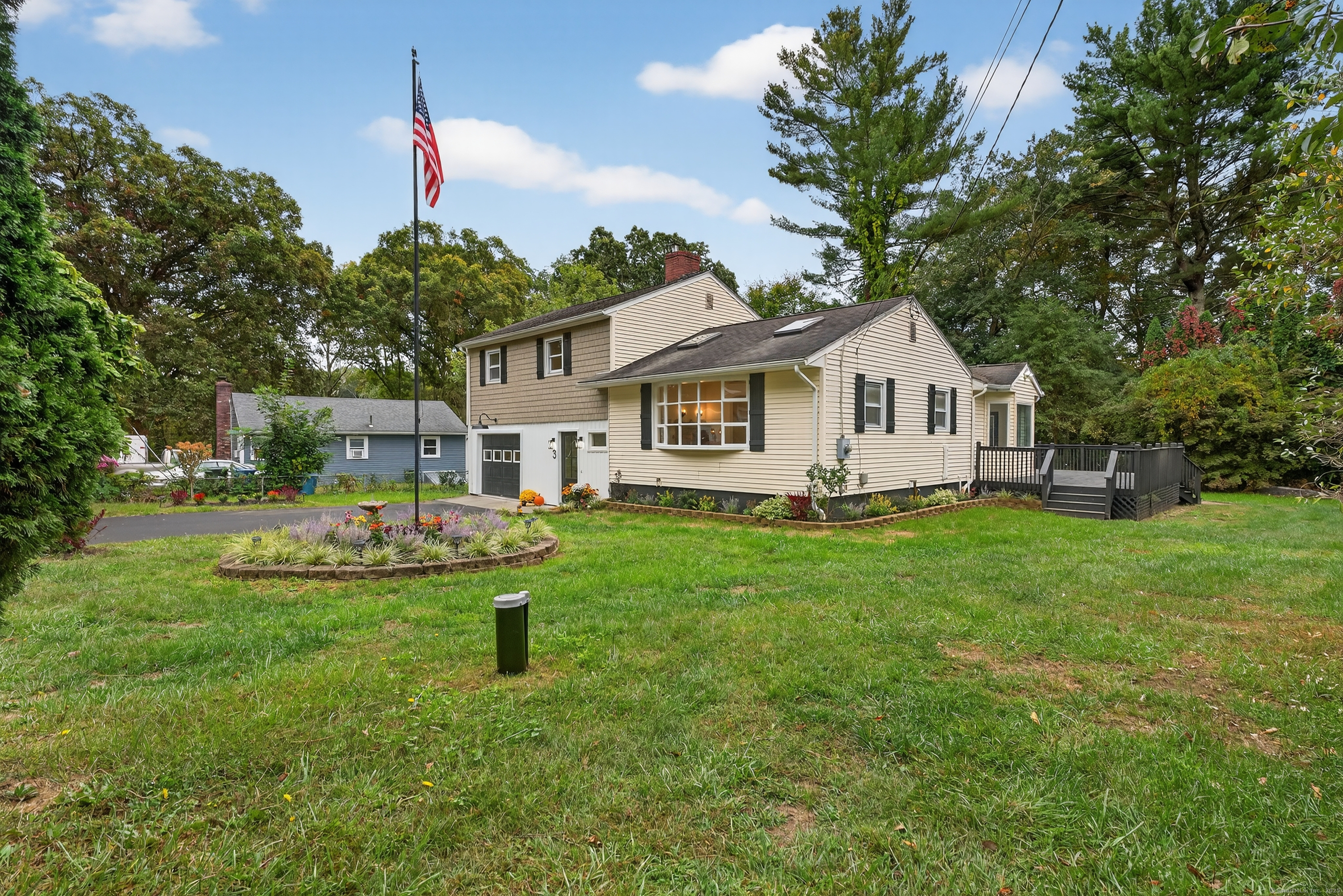 3 Webster Drive 1 Preston, CT 06365 - Photo 17 of 37 a front view of a house with garden
