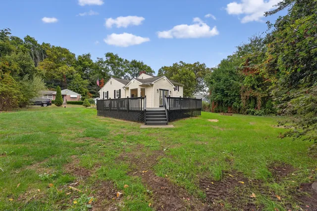 a view of a house with a big yard