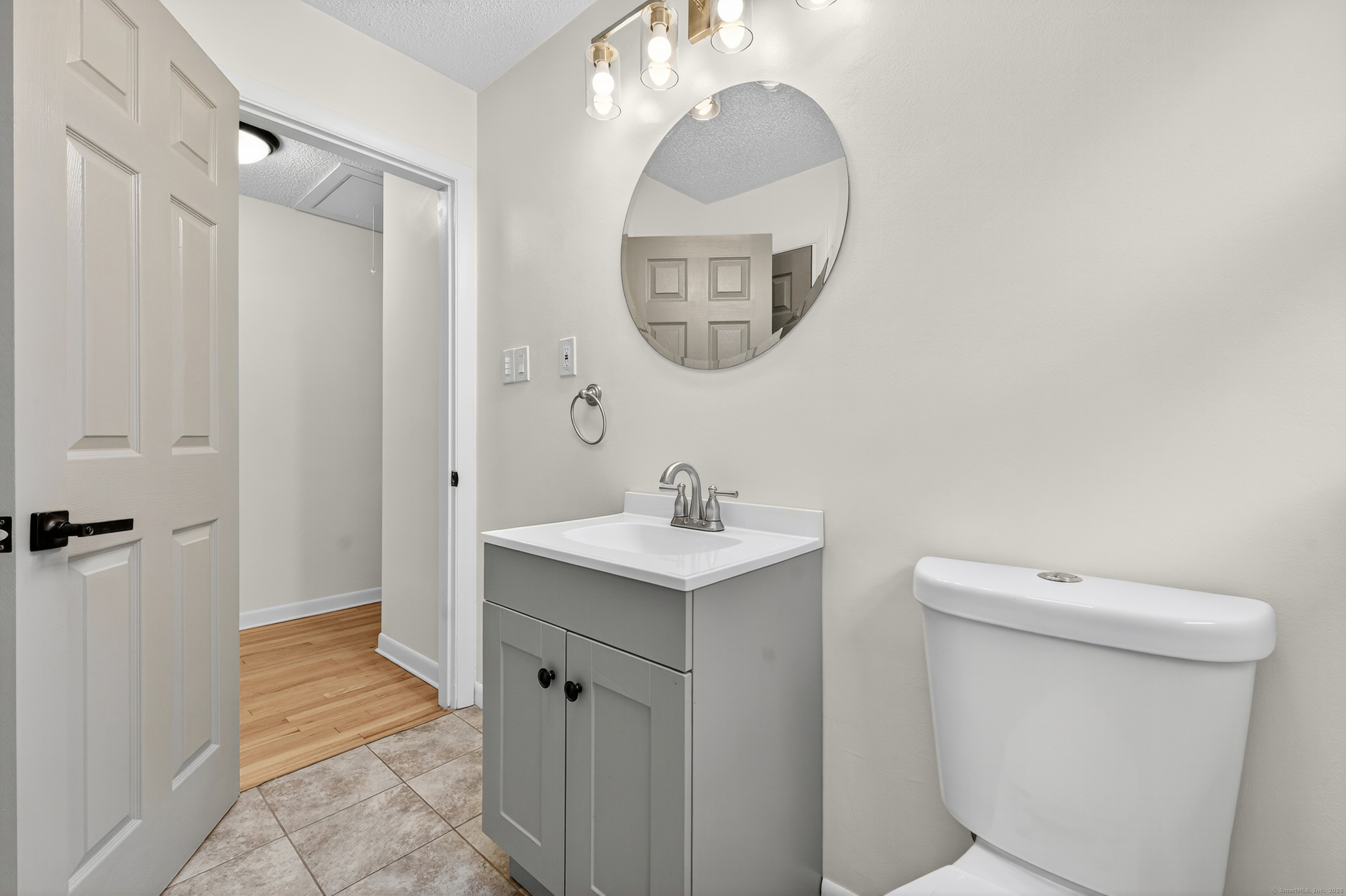 3 Webster Drive 1 Preston, CT 06365 - Photo 27 of 37 a bathroom with a sink a toilet and a mirror