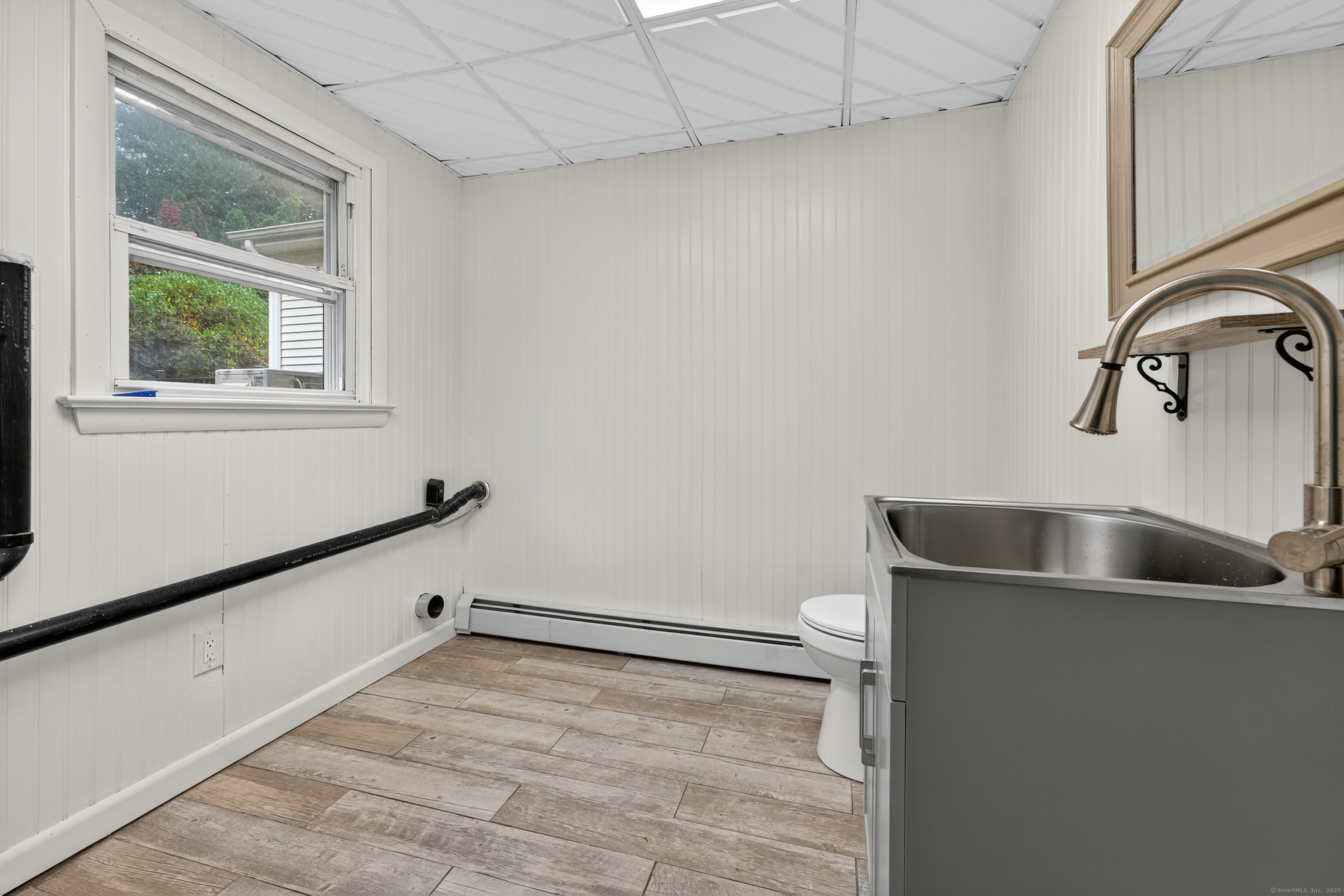 3 Webster Drive 1 Preston, CT 06365 - Photo 31 of 37 a bathroom with a sink and window